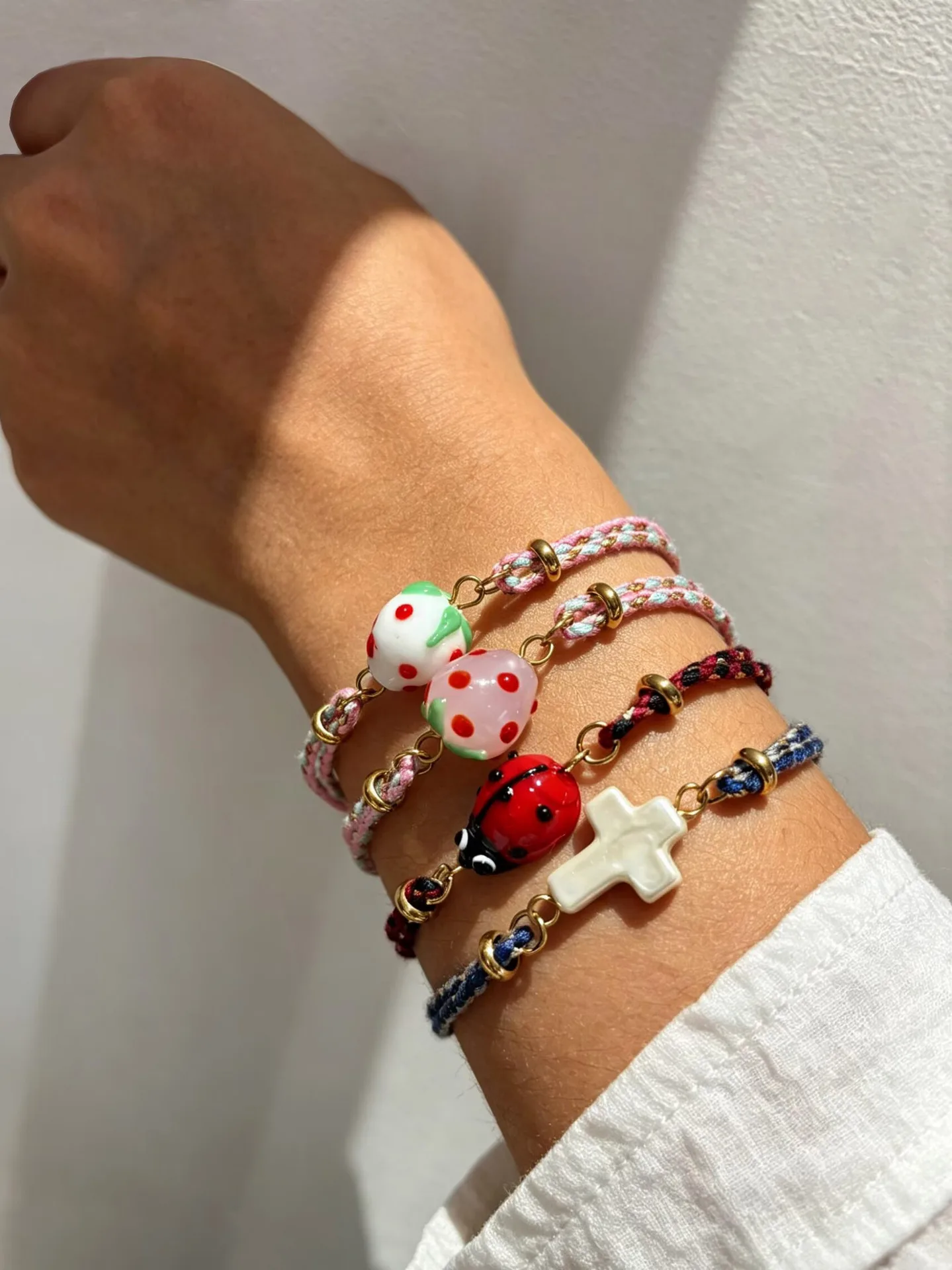 

New Fashion Design Summer Dopamine Color Hand Rope Ceramic Strawberry Cross-bead Insect Pendant Versatile Women's Bracelet