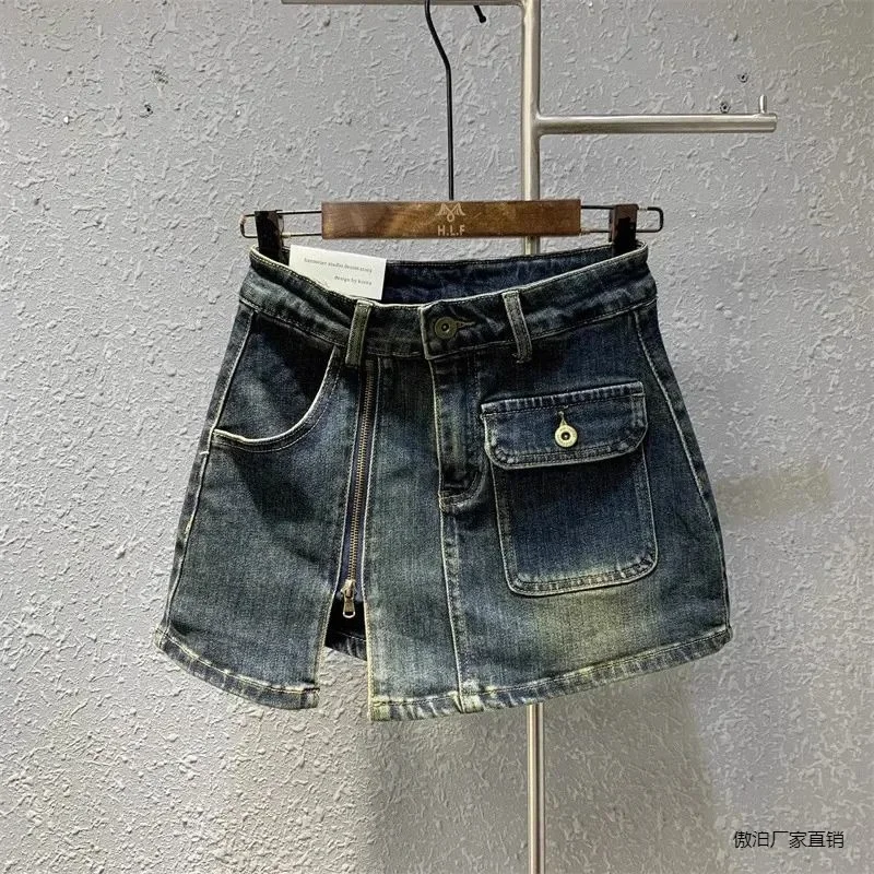 

American retro spice girl denim skirt female new fashion temperament zipper split design sense high waist slim hip skirt.