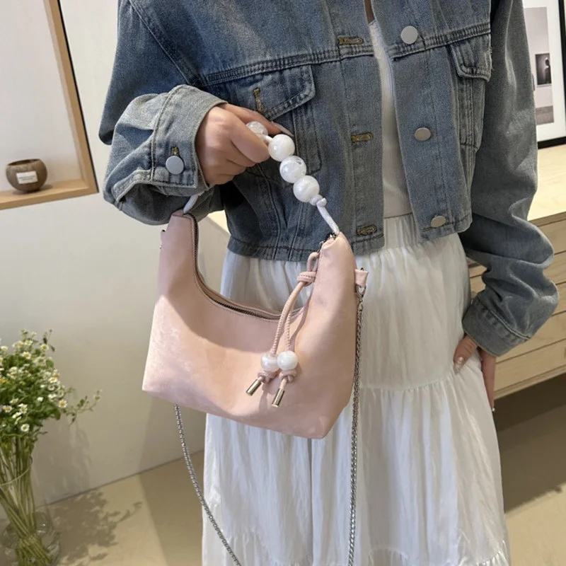 

Dumpling Bun 2024 Spring/Summer New Women's Handheld Diagonal Straddle Bag New Handheld Pearl Embroidered Fashion Casual Bag