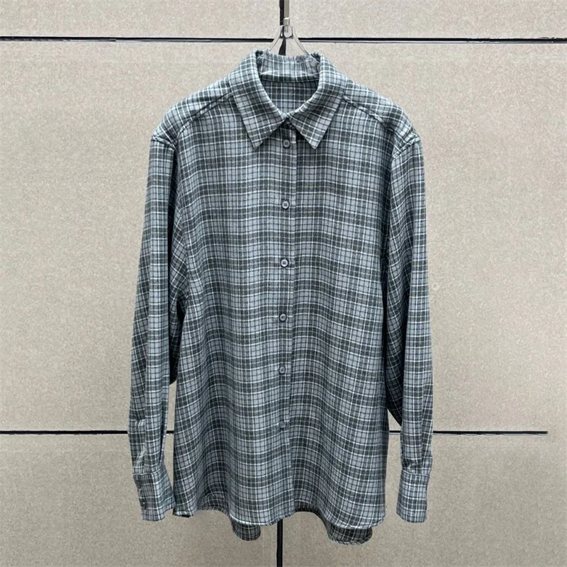 

Women's shirt 2026 Spring new asymmetrical shawl decorated long sleeved top Single breasted checkered Women's blouse Top women