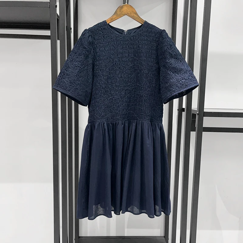 2026 Women's Textured Smocked Mini Dress | Short Sleeve Round Neck Ruffle Hem Dress (Available in White & Navy)