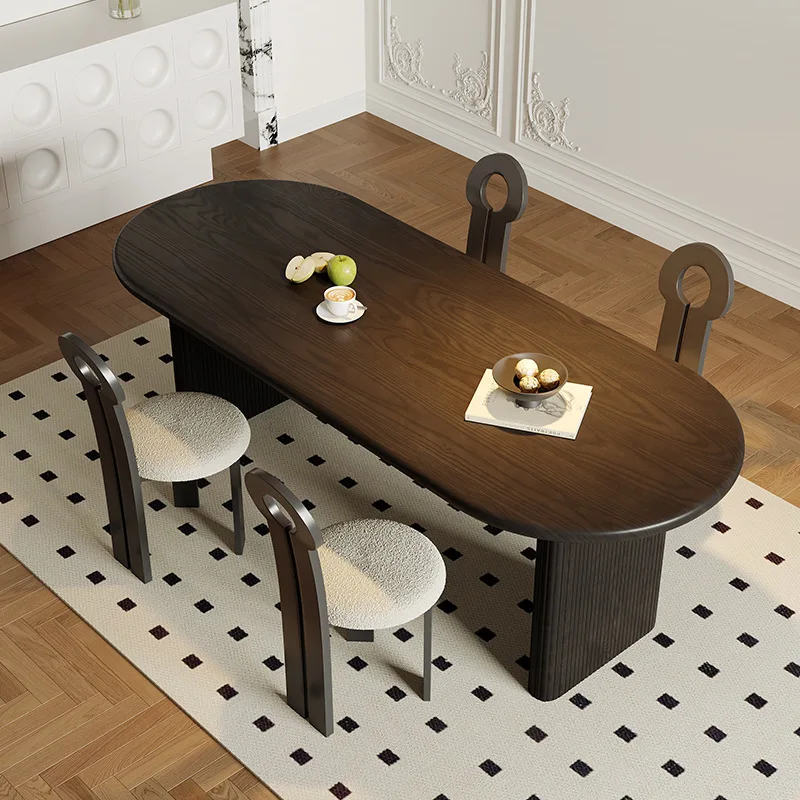 

Solid wood oval dining table, French living room 1.8 meters long black minimalist, Italian style silent wind, light luxury