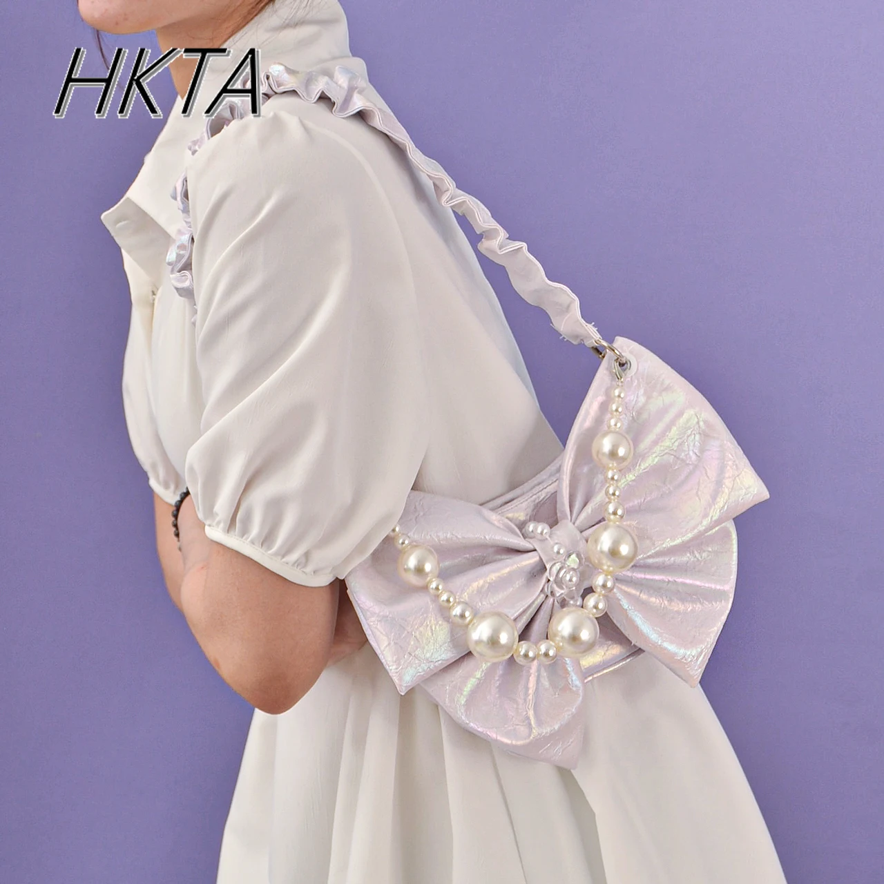 Borse stile francese Lolita dolci e carine da donna 2025 nuove borse eleganti con tracolla per ascelle con perle borse da donna viola moda estiva