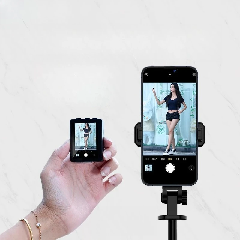

Mobile phone rear selfie display Mobile phone screen projection control Remote camera Bluetooth remote control