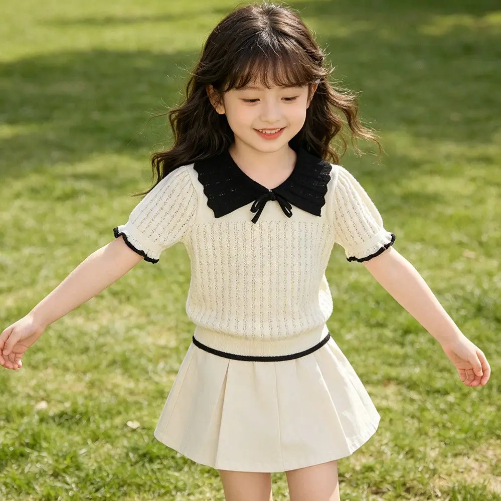 Girls Spring and Summer Sweet Doll Collar Tied Bow Short Sleeved Knitted Top with Hollow Out Design