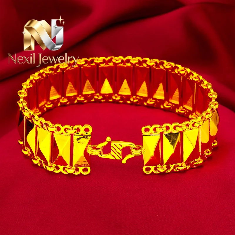 

Nexil Jewelry Nexil Jewelry Rhombus Wide Edge S-Clasp Bracelet Men's 24K Gold AU999 - Wide band fits wrist well, no tightness