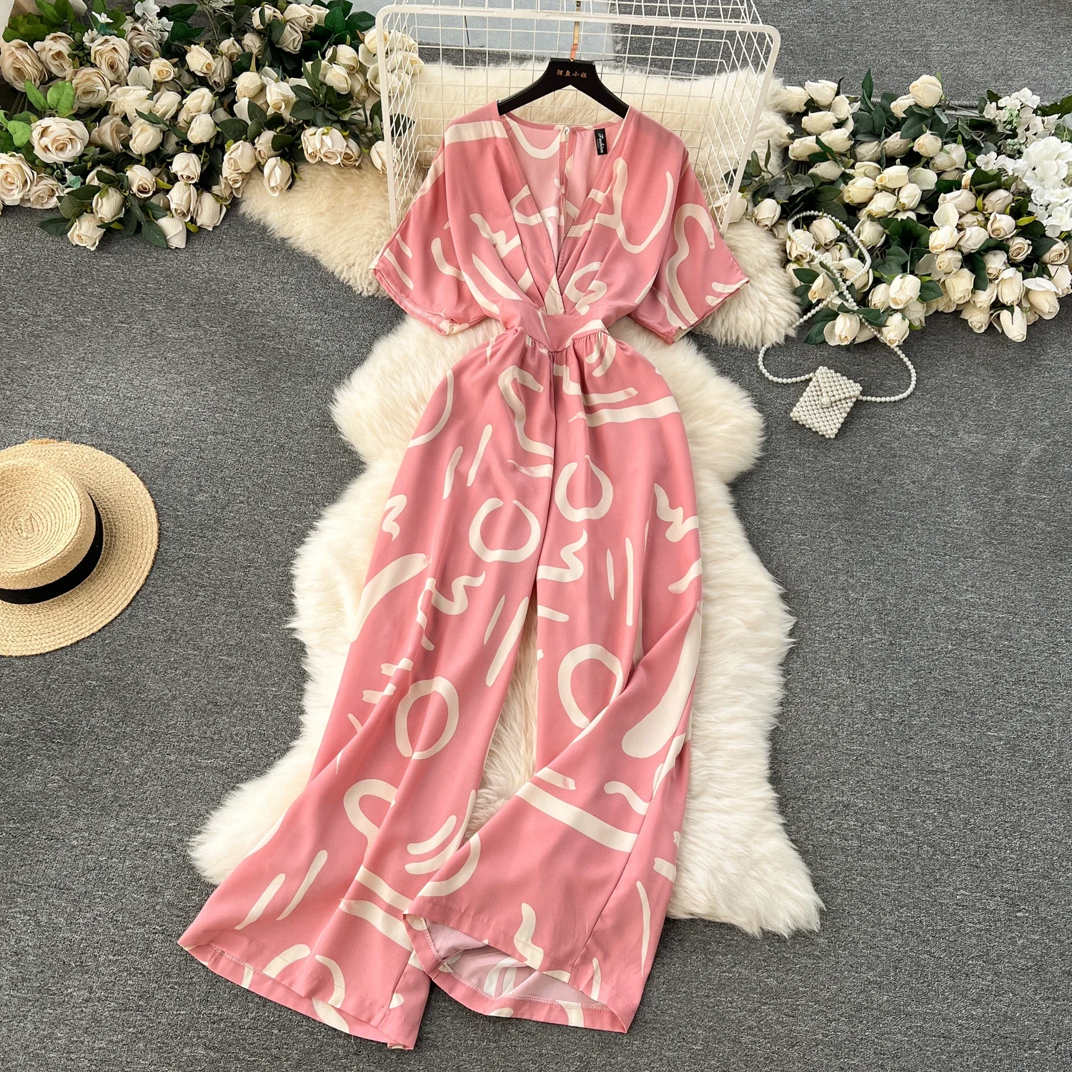 Tuta estiva casual da donna stampata a gamba larga con scollo a V femminile manica corta a sbuffo vita alta pagliaccetto allentato drappeggiato