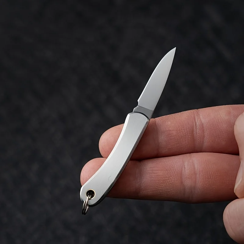 Mini navaja plegable de acero inoxidable, navaja de bolsillo portátil, colgante para llavero, adecuada para desempacar y abrir paquetes