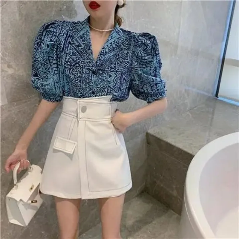 

2024 Summer New Korean Fashion Loose Fragmented Blossom Shirt Top+High Waist Slim Wide Leg Short Skirt Set of Two Female Clothes