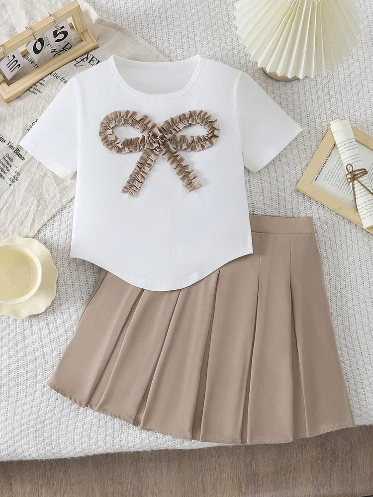 conjunto-de-duas-pecas-de-primavera-e-verao-feminino-e-infantil-tridimensional-arco-manga-curta-top-e-saia-plissada-de-cor-solida