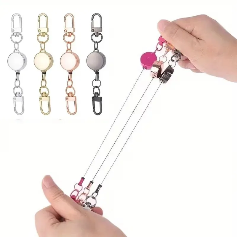 1 unidad de llavero retráctil antirrobo de metal con cuerda elástica de fácil extracción, accesorio deportivo para llaves