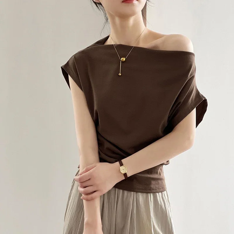 สไตล์ฝรั่งเศสแฟชั่นปิดไหล่สีทึบแขนสั้นเสื้อยืดฤดูใบไม้ผลิ/ฤดูร้อนใหม่ Retro Casual เซ็กซี่คุณภาพสูง Lady Top