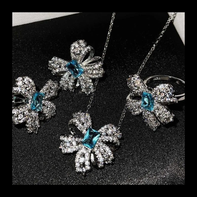 يوصي Xiaohongshu هوت كوتور مجوهرات الفراشة مجموعة تقليد التوباز الطبيعي القوس قلادة حلقة وأقراط. #1