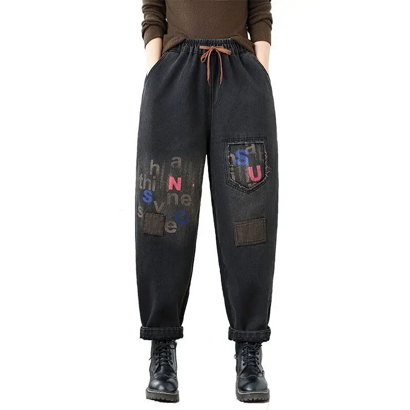 Retro velvet thick fashion street jeans women's winter new letter print loose casual fashion artistic harem pants