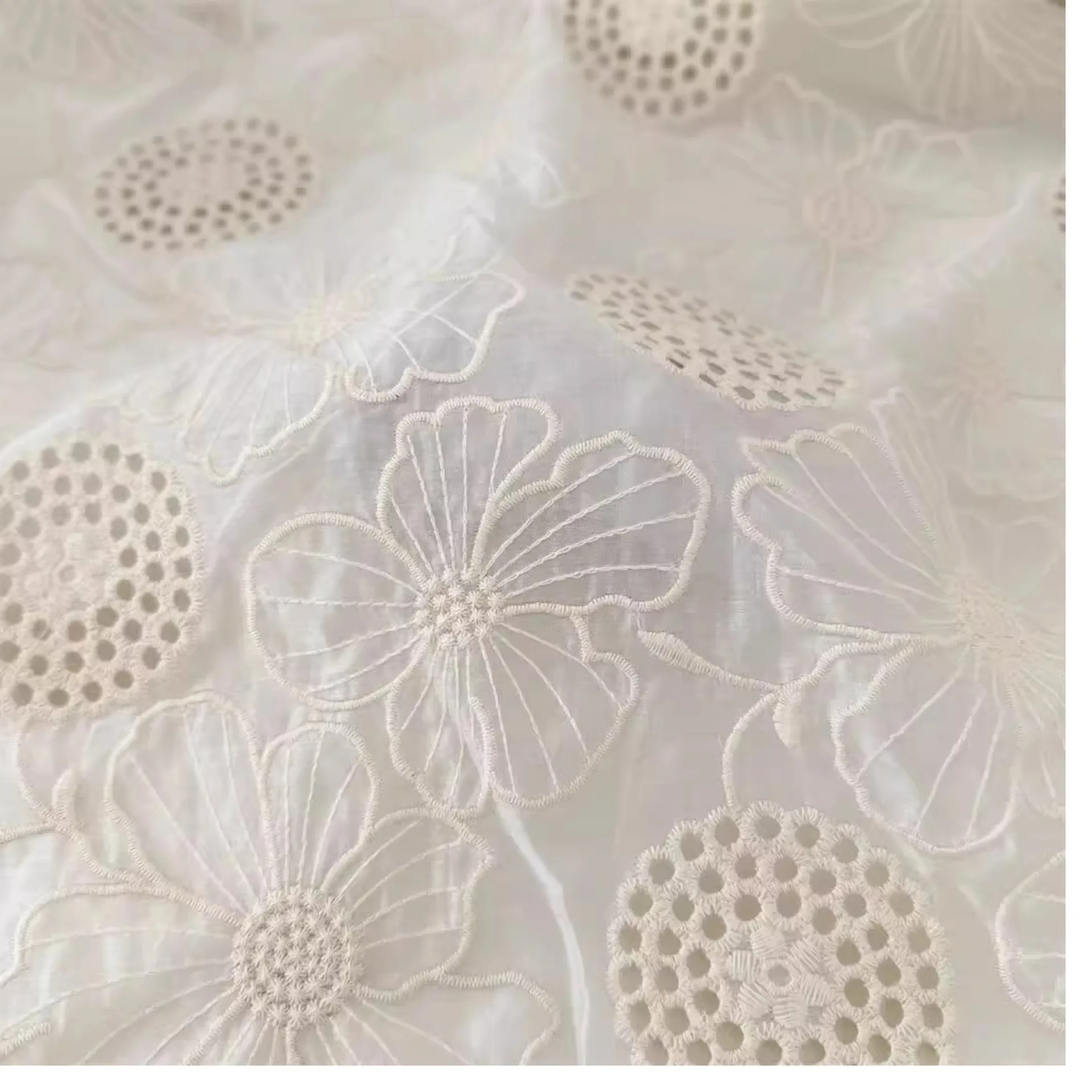 

High-quality all-cotton lace embroidered hollow flower pure cotton fabric full-width children's dress fabric designer fabric