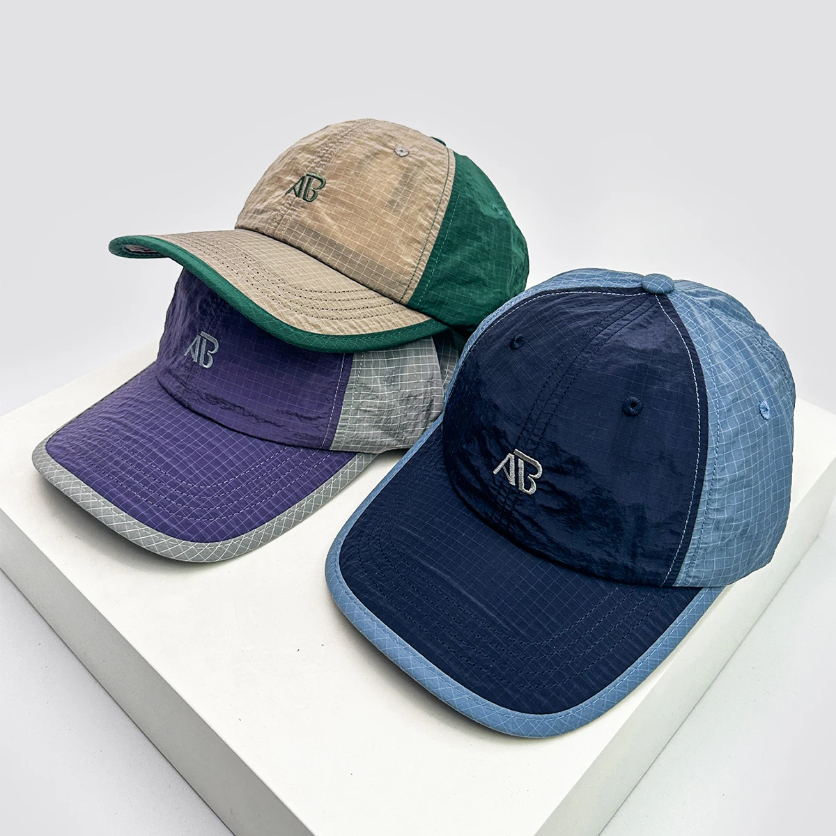 

New Unisex Small Squares Embroidered AB Letters Baseball Hats Quick Drying Breathable Color Block Sunshade Peaked Caps Versatile