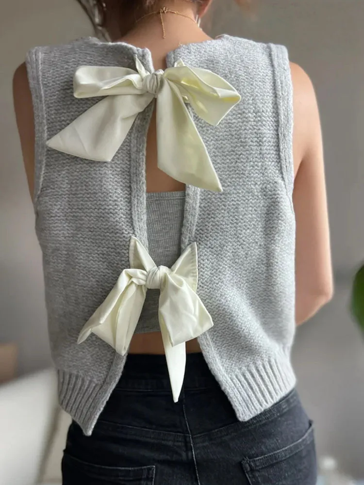 

Осень 2024, удобный мягкий женский свитер с бантом, жилет без рукавов, свитер, новый повседневный вязаный топ с круглым вырезом и вырезом в стиле пэчворк
