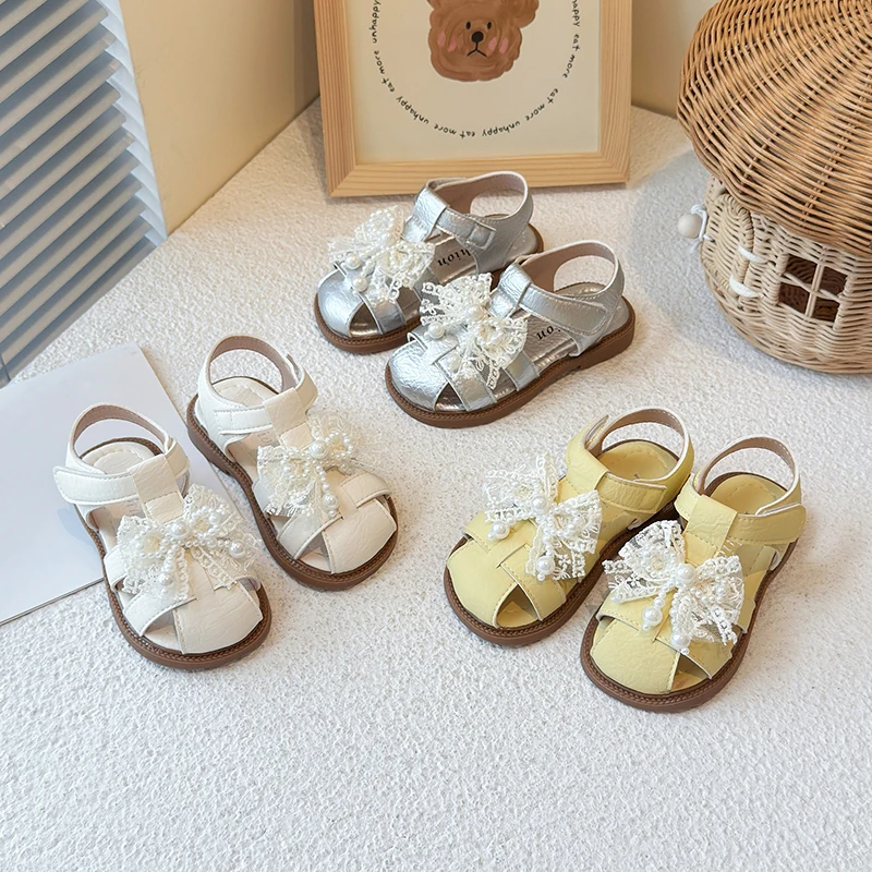 

2025 Summer New Princess Pearl Knot Sandals for Girls Style Korean Version Head Cover Slippers Beach Shoes Children's Footwear