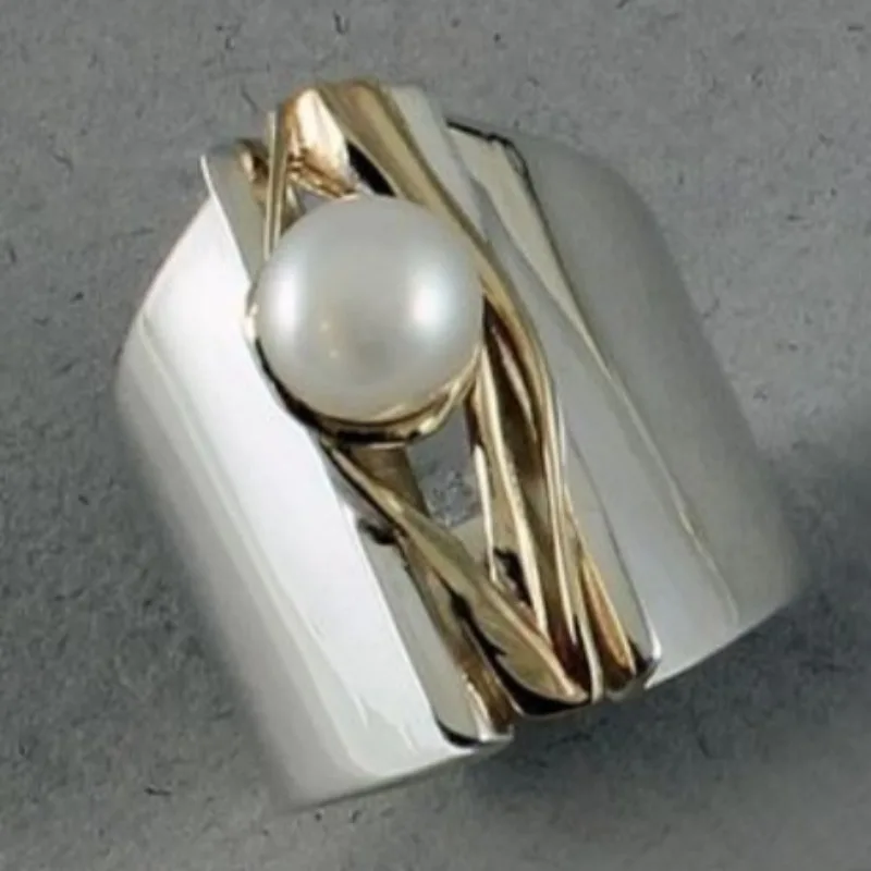 Abstract Wide Cocktail Ring Two Tone Silver and Gold Twisted Interwoven Straps Wrapped Imitation Pearl Ring Daily Wear At Partie