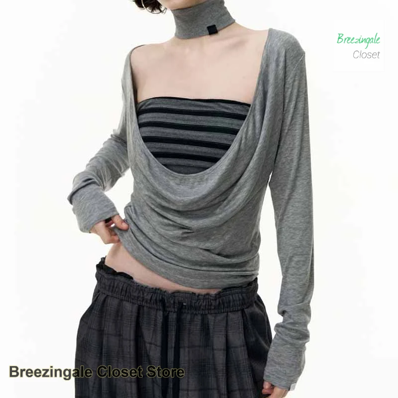 

Korean retro striped fake two-piece long-sleeved T-shirt women's spring and summer new high-grade simple casual Joker top.