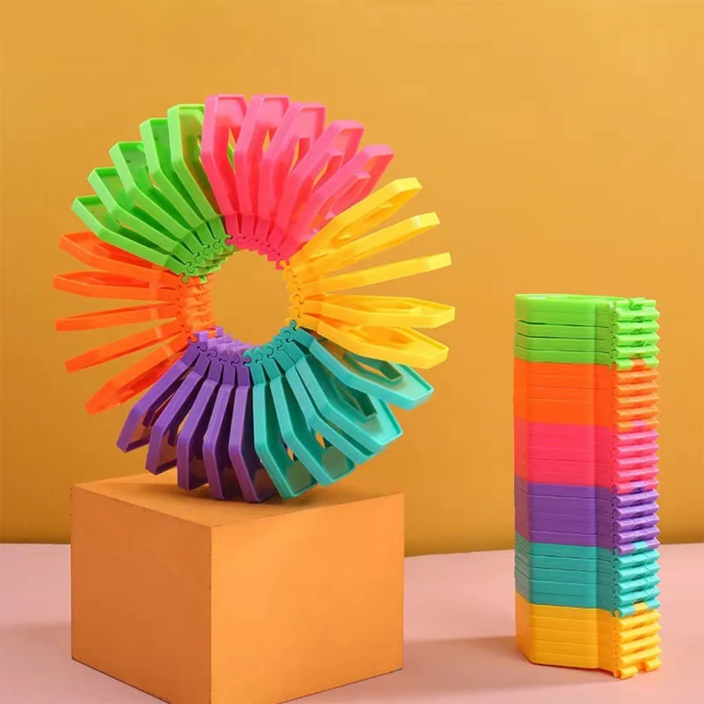 Multi-forma arco-íris molas mágicas de plástico crianças meninos meninas arco-íris molas mágicas brinquedos goodie saco festa de aniversário favores