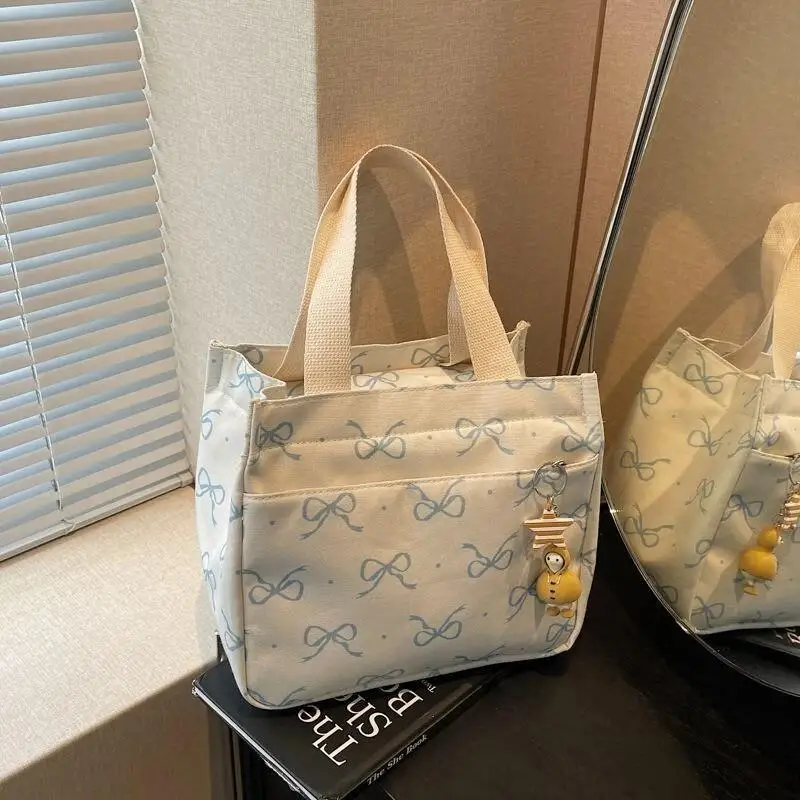 nueva-bolsa-de-lona-de-alta-estetica-para-mujer-bolso-de-mano-simple-y-portatil-para-el-almuerzo-organizador-para-el-trabaj
