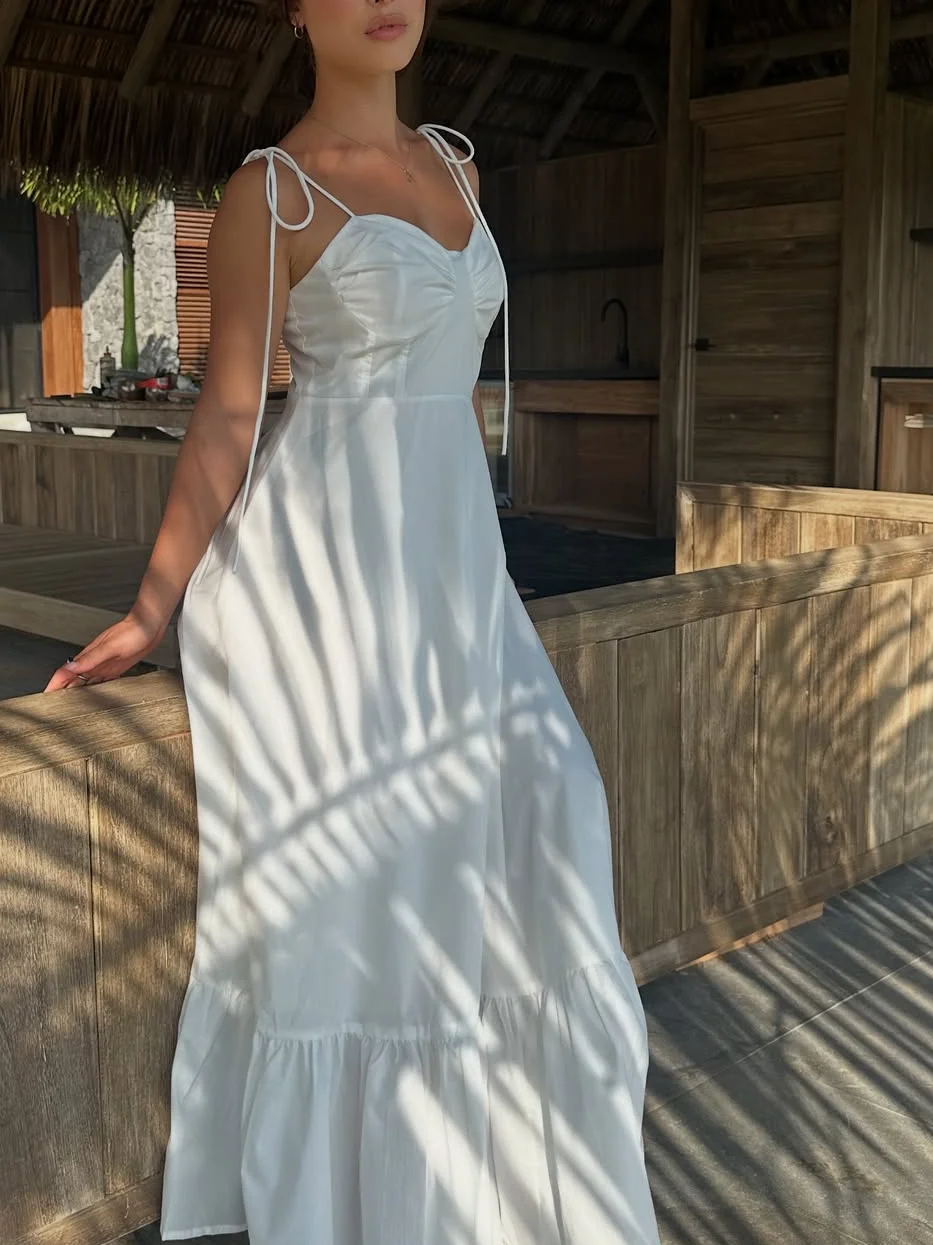 Vestido Retro de viajero para mujer, novedad de verano, tirantes negros, costura multicapa, vestido para vacaciones en la playa, moda informal Sexy con cuello en V