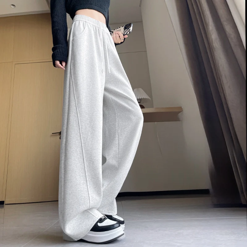 Damskie spodnie dresowe hip-hop na jesień i zimę 2025, modne, elastyczny pas, luźne, szerokie nogawki, proste, jednolite, ze sznurkiem.