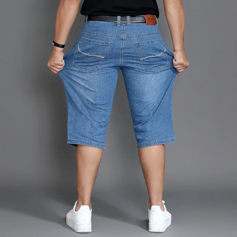 Pantaloncini estivi pantaloni al polpaccio Plus Size 48 42 uomo Denim elastico allungato sottile Jean oversize classico dritto Streetwear