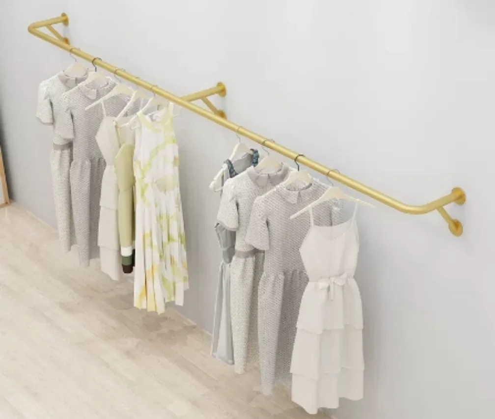 

Clothing store display rack hanging on the wall, women's clothing store side wall hanging rack, children's clothing gold display