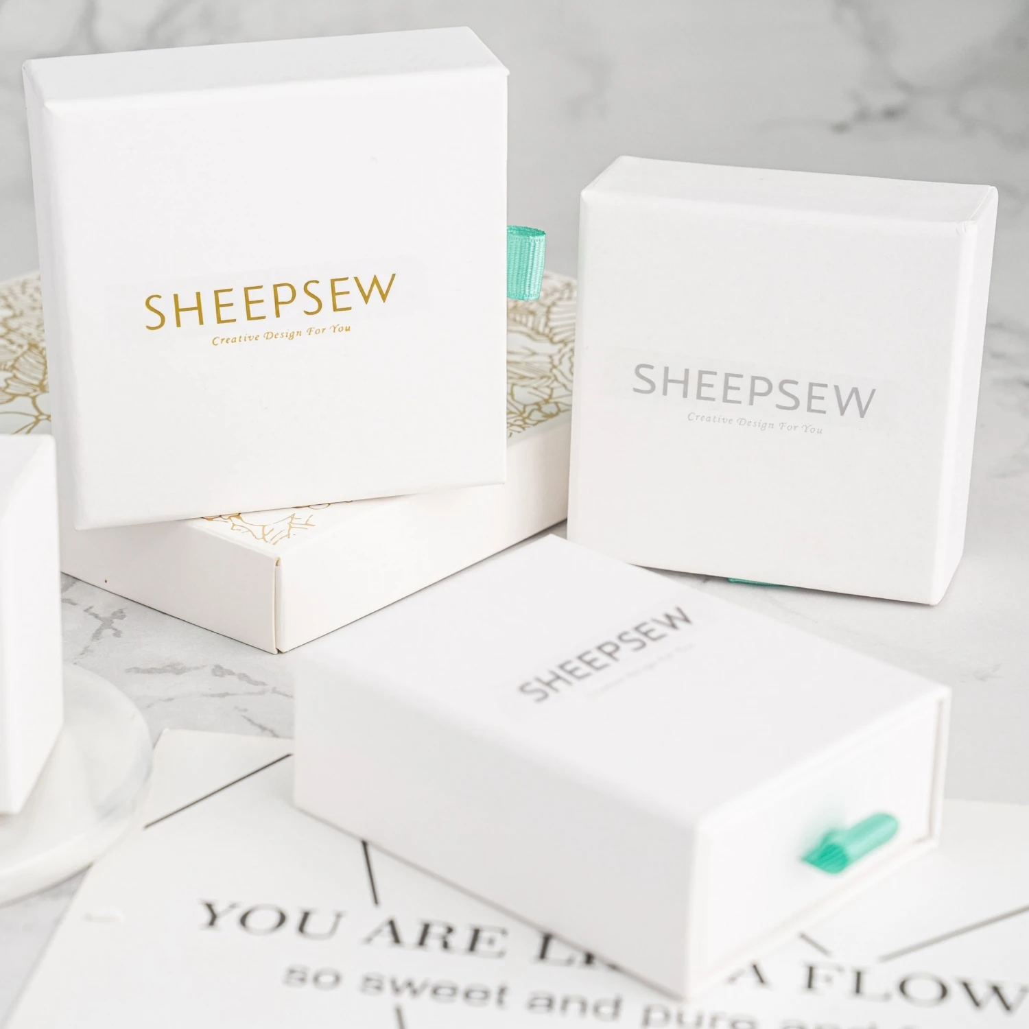 20pcs-high-quality-9-9cm-microfiber-foldable-jewellery-gift-pouches-personalized-paper-ring-sliding-jewelry-packaging-pouch-boxe