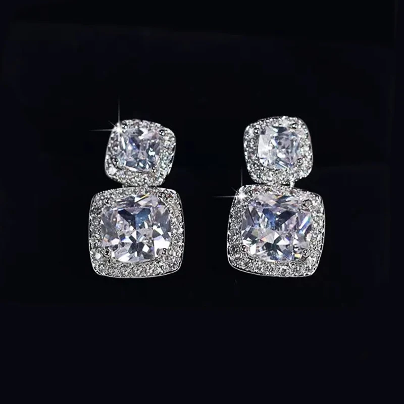 Huitan-pendientes colgantes de cristal CZ para mujer, accesorio de moda para la oreja, joyería de Color plateado de alta calidad