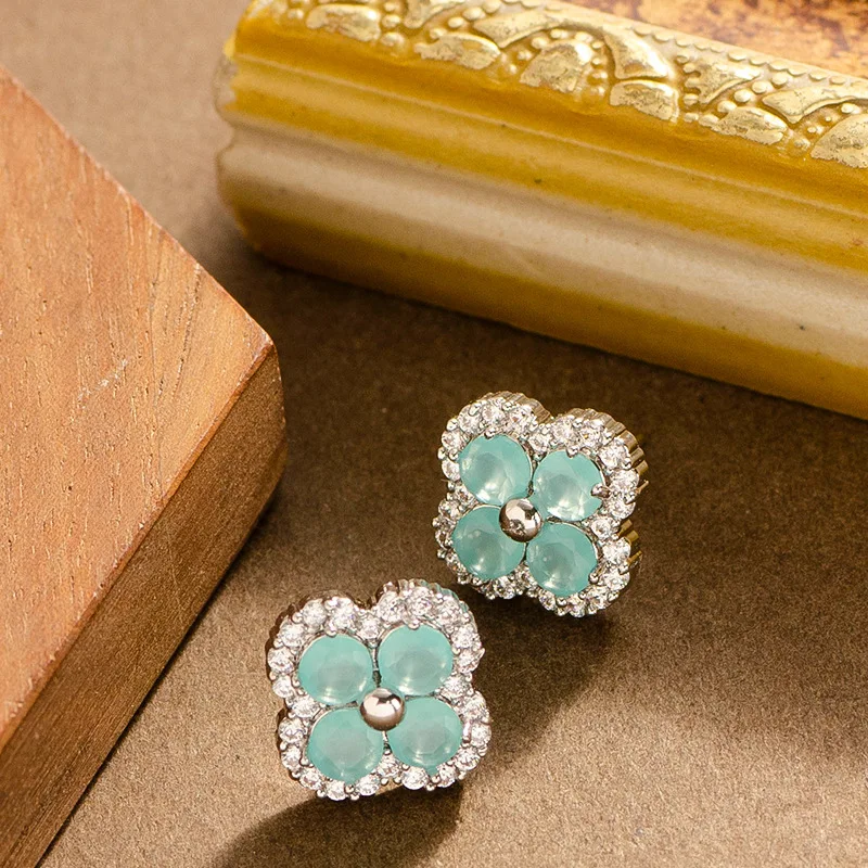 Koreanische Version von Super Fairy Sweet Jelly Farbe voller Diamanten Zirkon vierblättriges Kleeblatt Sonnenblumen Ohrstecker weiblich explosiv