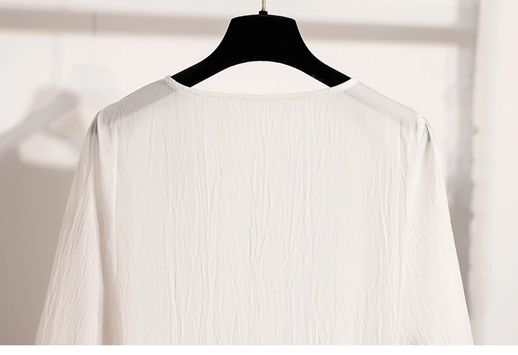 2026 Weiße Bluse mit Kordelzug-Taille, langen Ärmeln, lockerem Schnitt, verjüngendem Peplum, Babydoll-Stil, lässiges Top aus Crinkle-Stoff – Detail 16