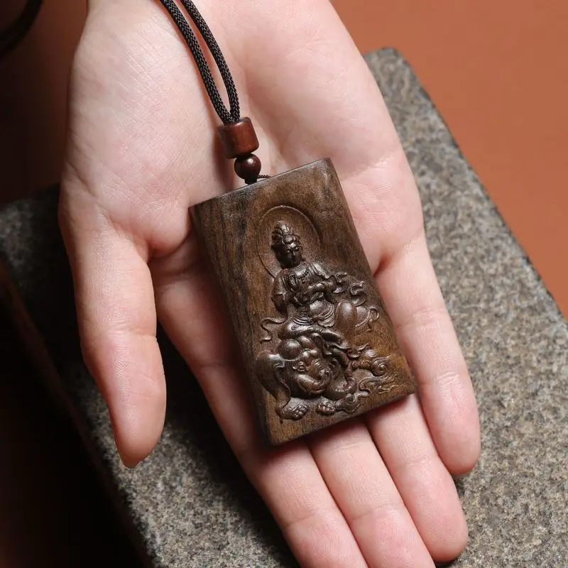 Hand-carved agarwood pendant featuring the Shakyamuni Guanyin Bodhisattva, made of high-quality wood, suitable for use as a