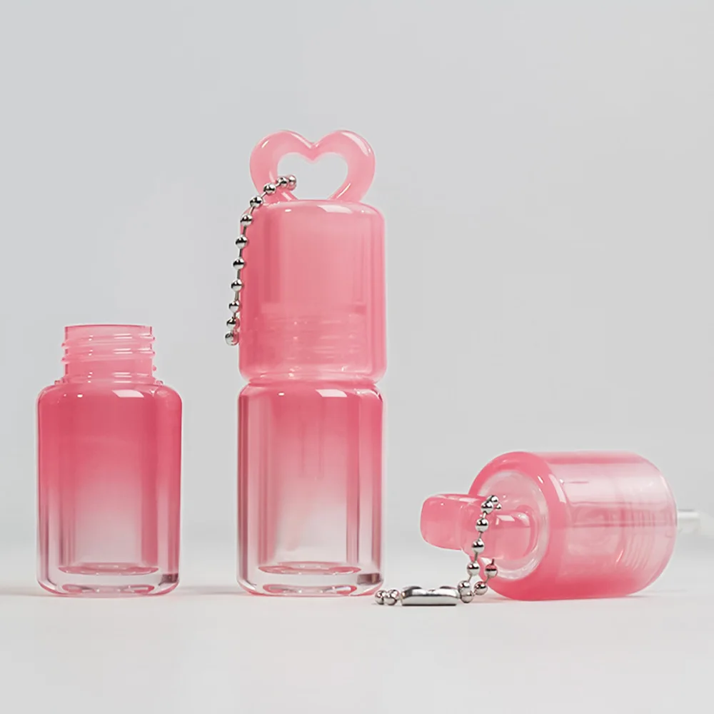 ハート型のグラデーションカラーリップグロスチューブ、大きなワンドブラシ付きリップオイルボトル、空のリップグロスチューブ、リップスティックボトル容器