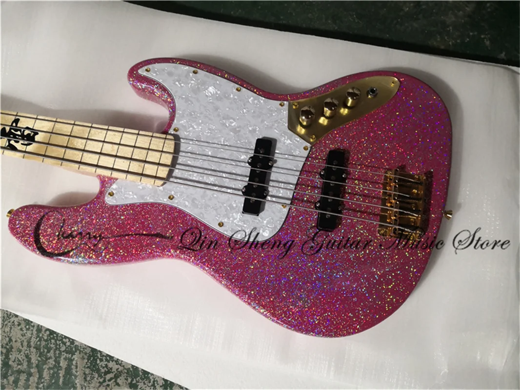 4 strings bass guitar, jaz bass Pink Silver powder particles body,gold buttons,white pearl pickguard fixed bridge gold tuners