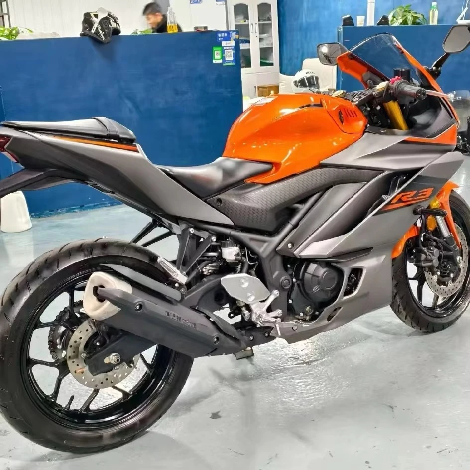 Rs 321Cc sports motorcycle, liquid-cooled twin with ABS system, suitable for track and street performance requirements
