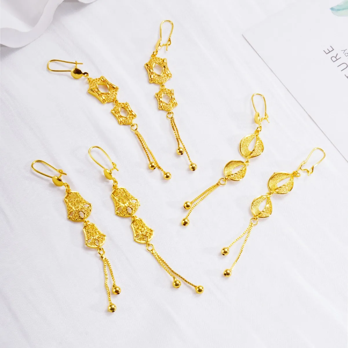9999 gold hollow earrings - simple and versatile leaf-shaped tassel ear hooks jewelry