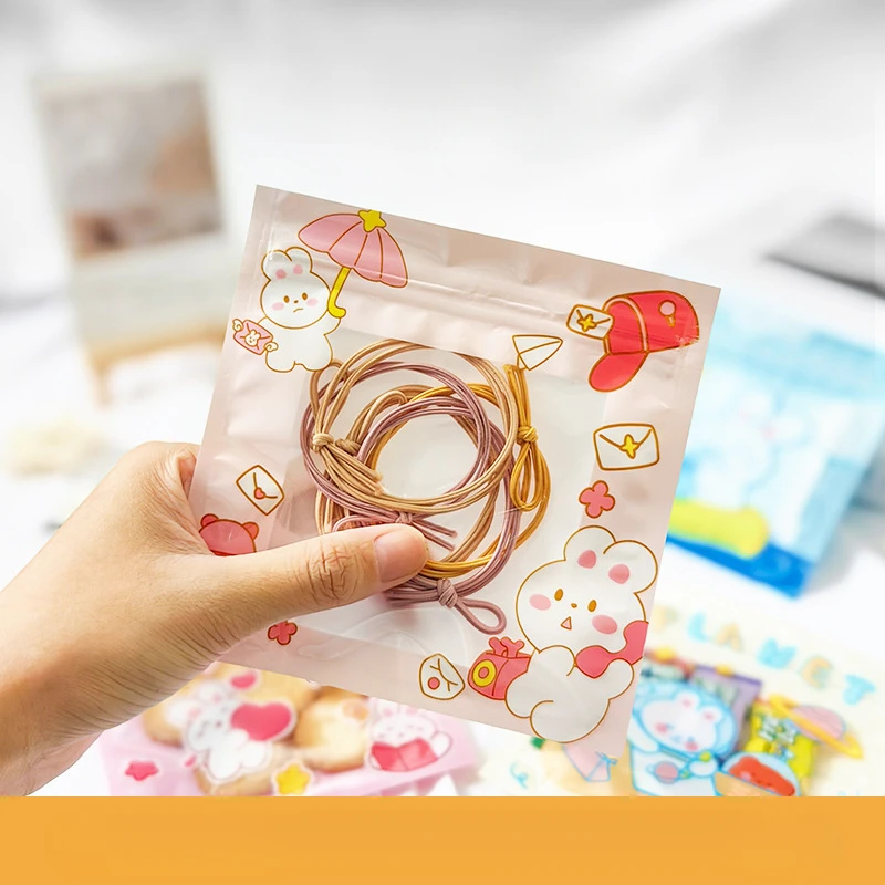 100 الكرتون لطيف رائعتين اكسسوارات مشبك شعر التعبئة والتغليف حقيبة تخزين المجوهرات كابل بيانات حقيبة عزل العناصر الصغيرة الذاتي حقيبة عزل