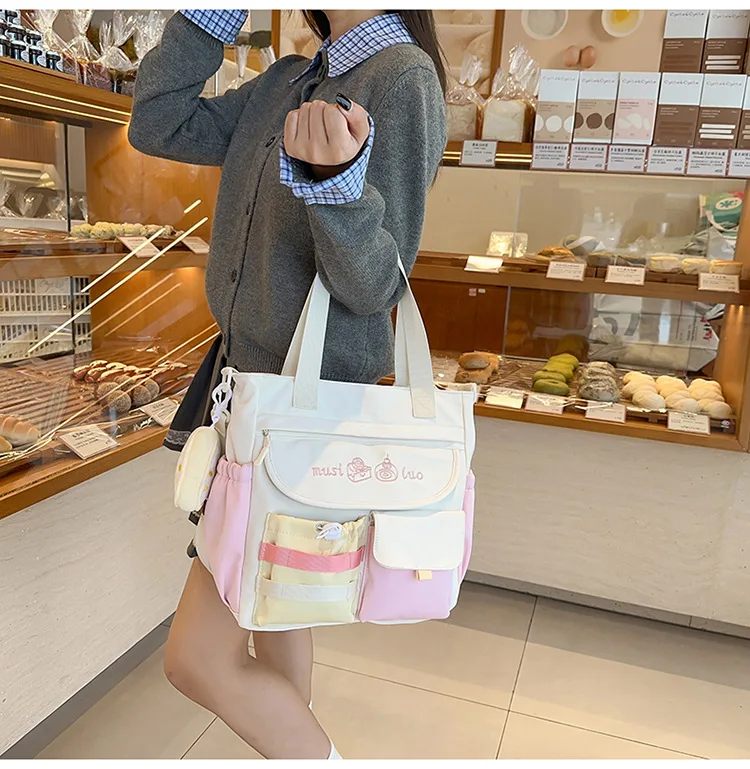 حقيبة كروس جميلة ذات ألوان متباينة ذات سعة كبيرة حقيبة يد من فئة الطالبات جميع أنواع حقيبة علاجية من النايلون كاواي