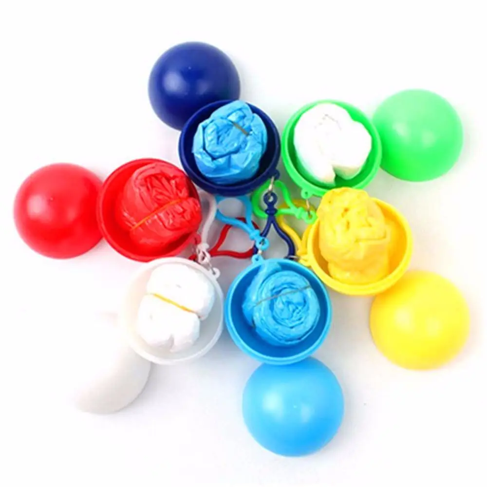 Disposable Outdoor Camping Ball Keyring Key Chain Outdoor Rainwear Rain Cover Raincoat Ball Hooded Ponchos