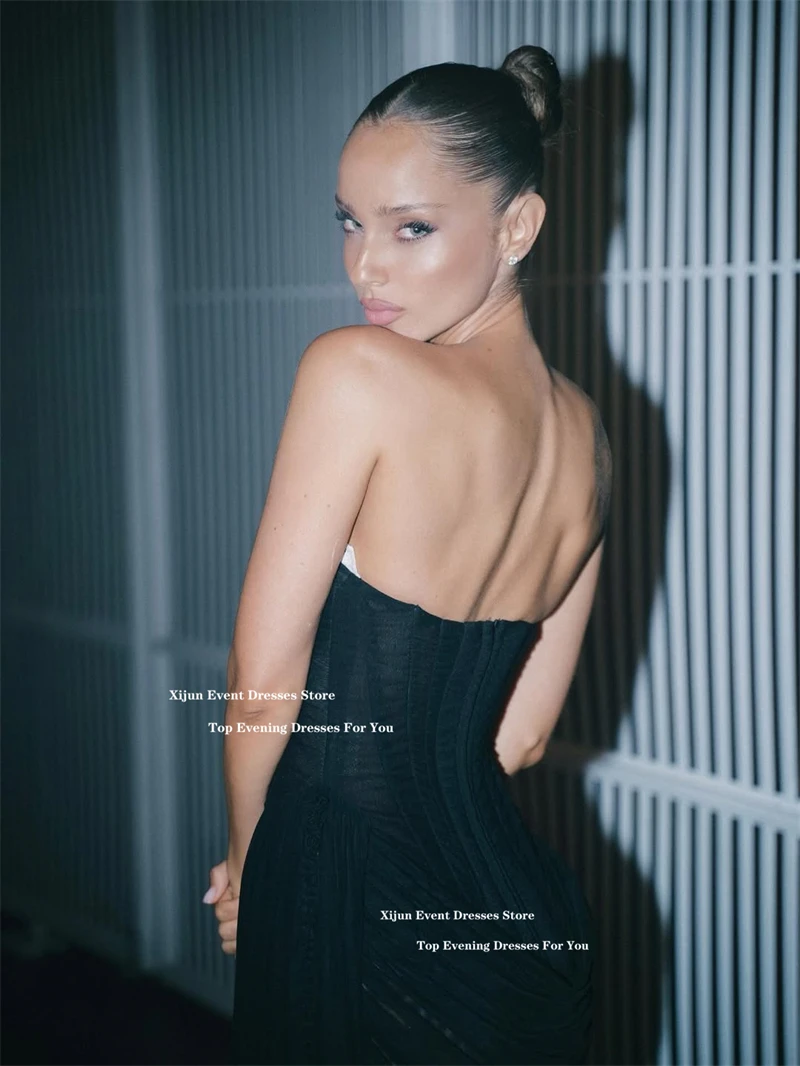 فساتين سهرة قصيرة سوداء حديثة من Xijun بدون أكمام مطوي لحفلات أعياد الميلاد بدون حمالات فساتين حفلات رسمية قصيرة مخصصة