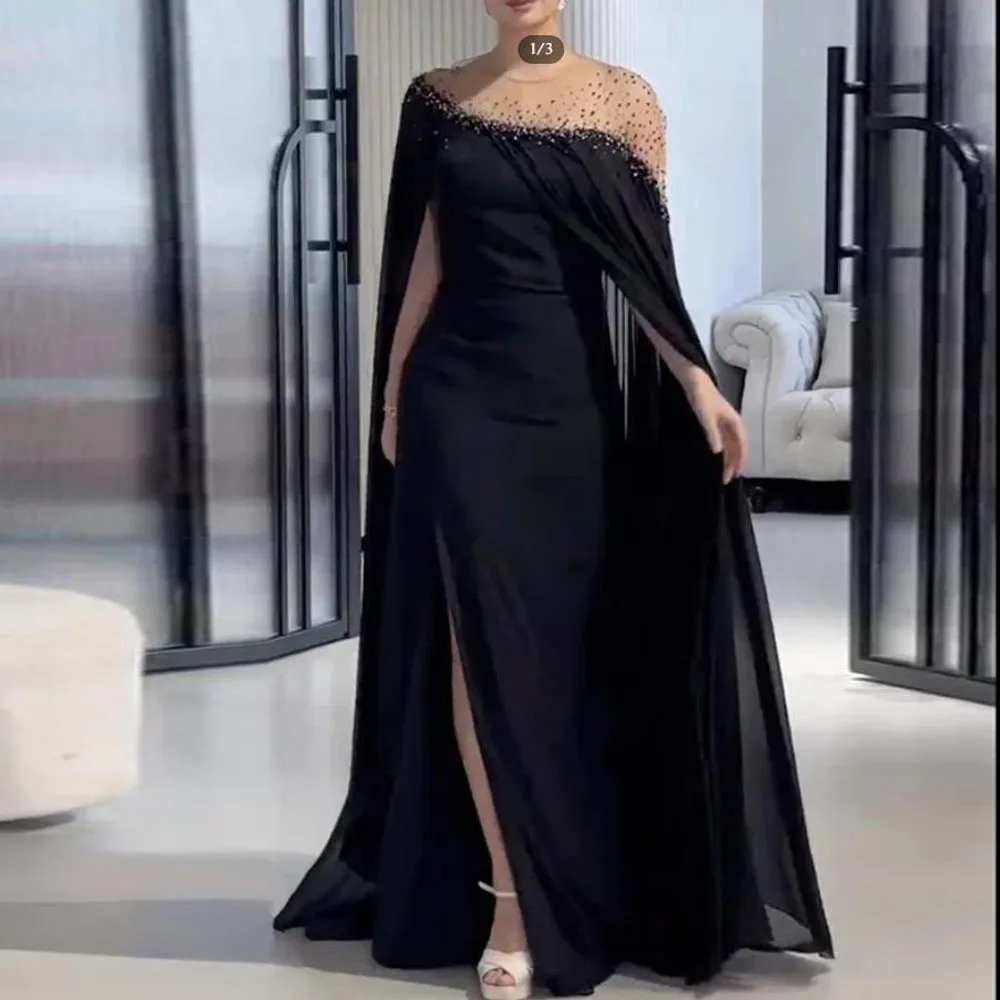 

Вечернее платье-кафтан из бисера по индивидуальному заказу. Прозрачный вырез. Платья русалки для торжественных случаев с рукавами-накидкой. Шифоновое платье с разрезом по бокам.