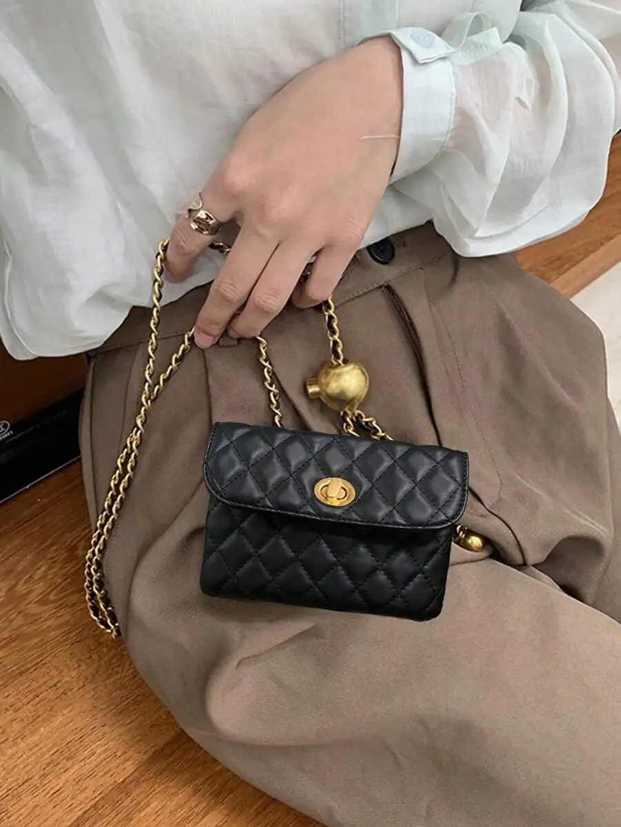 

Black Quilted Mini Crossbody Bag with Gold Chain Strap and Turn-Lock Closure