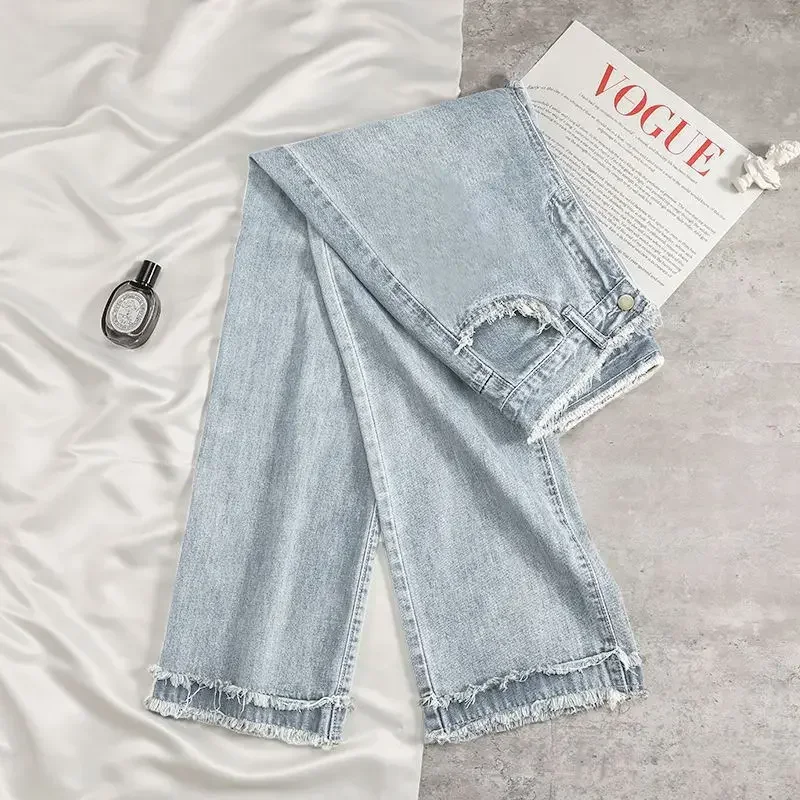 Jeans larghi bianchi stile coreano Donna Primavera Estate Vita alta Pantaloni a gamba larga con bordo grezzo Pantaloni lunghi in denim sottile tutto abbinato