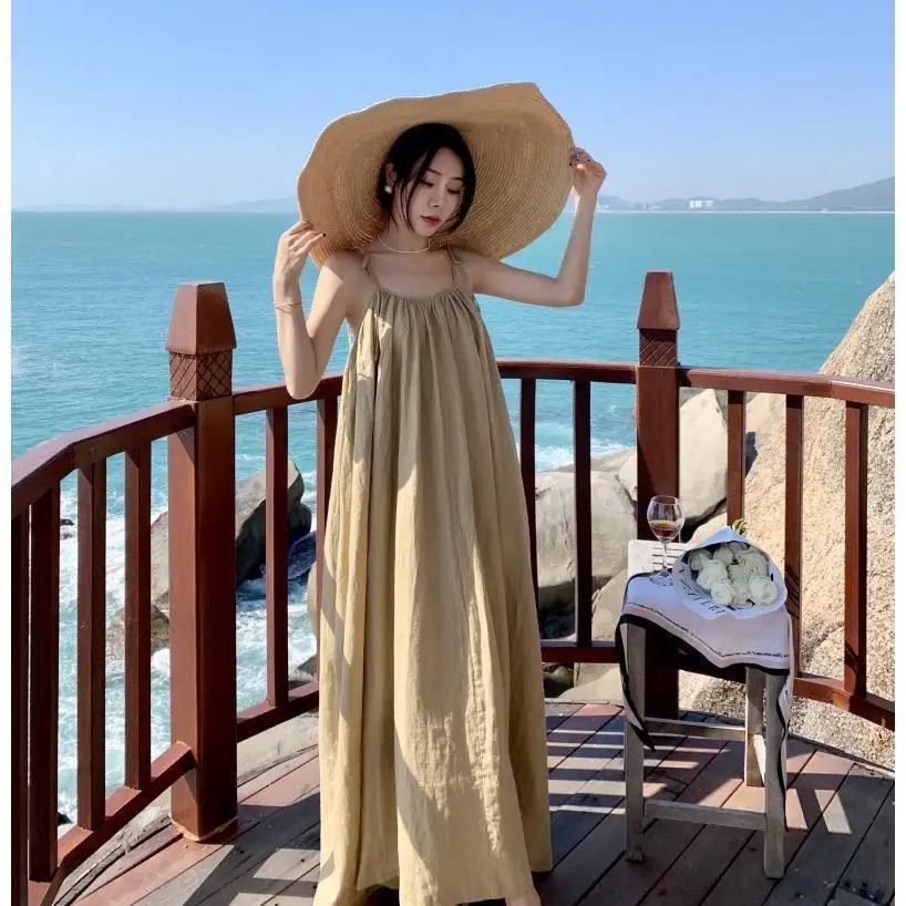 2024 new summer long temperament loose fairy long skirt Sanya beach holiday wind strap dress
