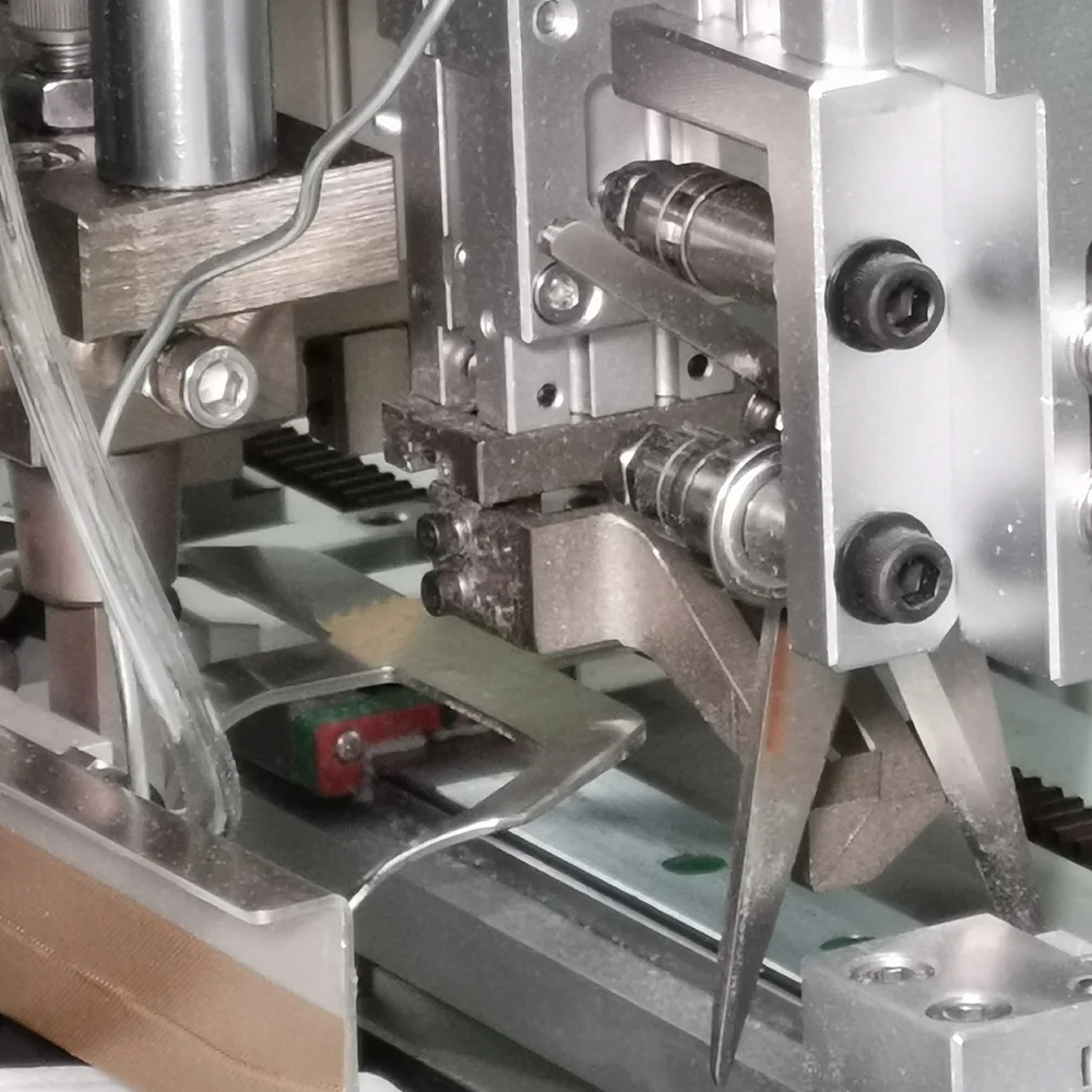 Automatic mask machine elastic belt head-mounted outer ear belt positioning automatic mask machine factory