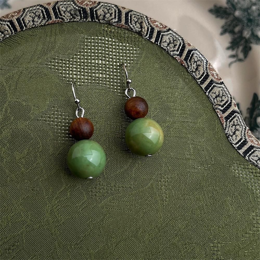 

Fashion Elegant Serpentine Natural Stone Earrings Women's Niche High-end Design Wooden Geometric Studs Retro Jewelry
