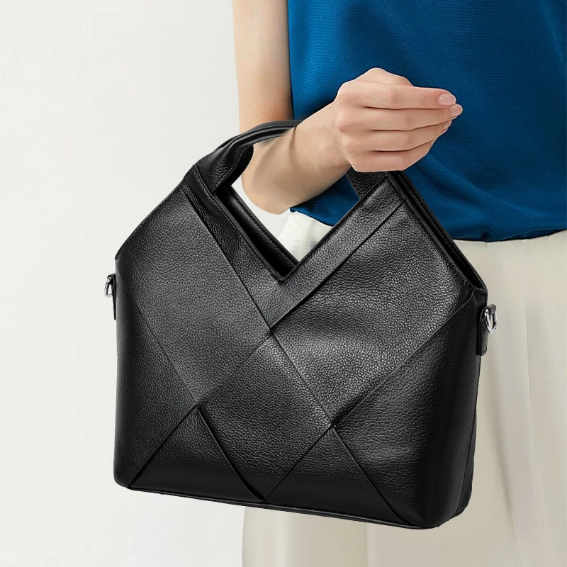 

New autumn leather handbag in top-grade leather with stylish design. Fashionable soft leather handbag for carrying or slinging.